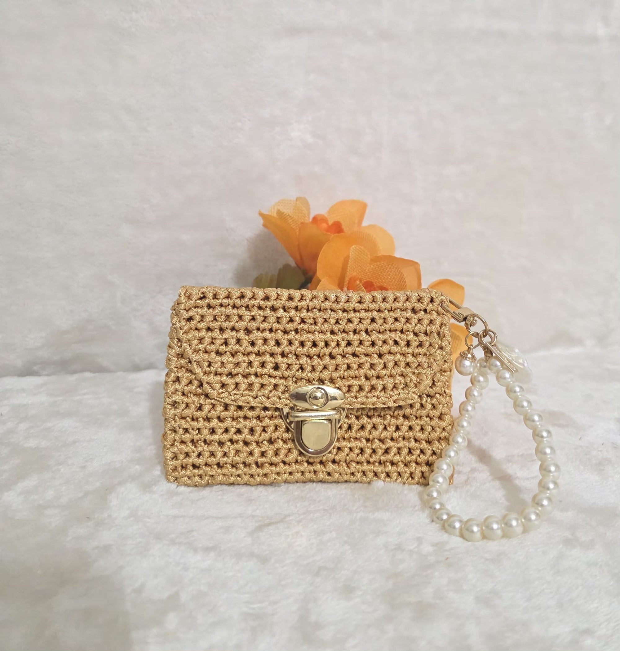 Juego de monedero y aretes