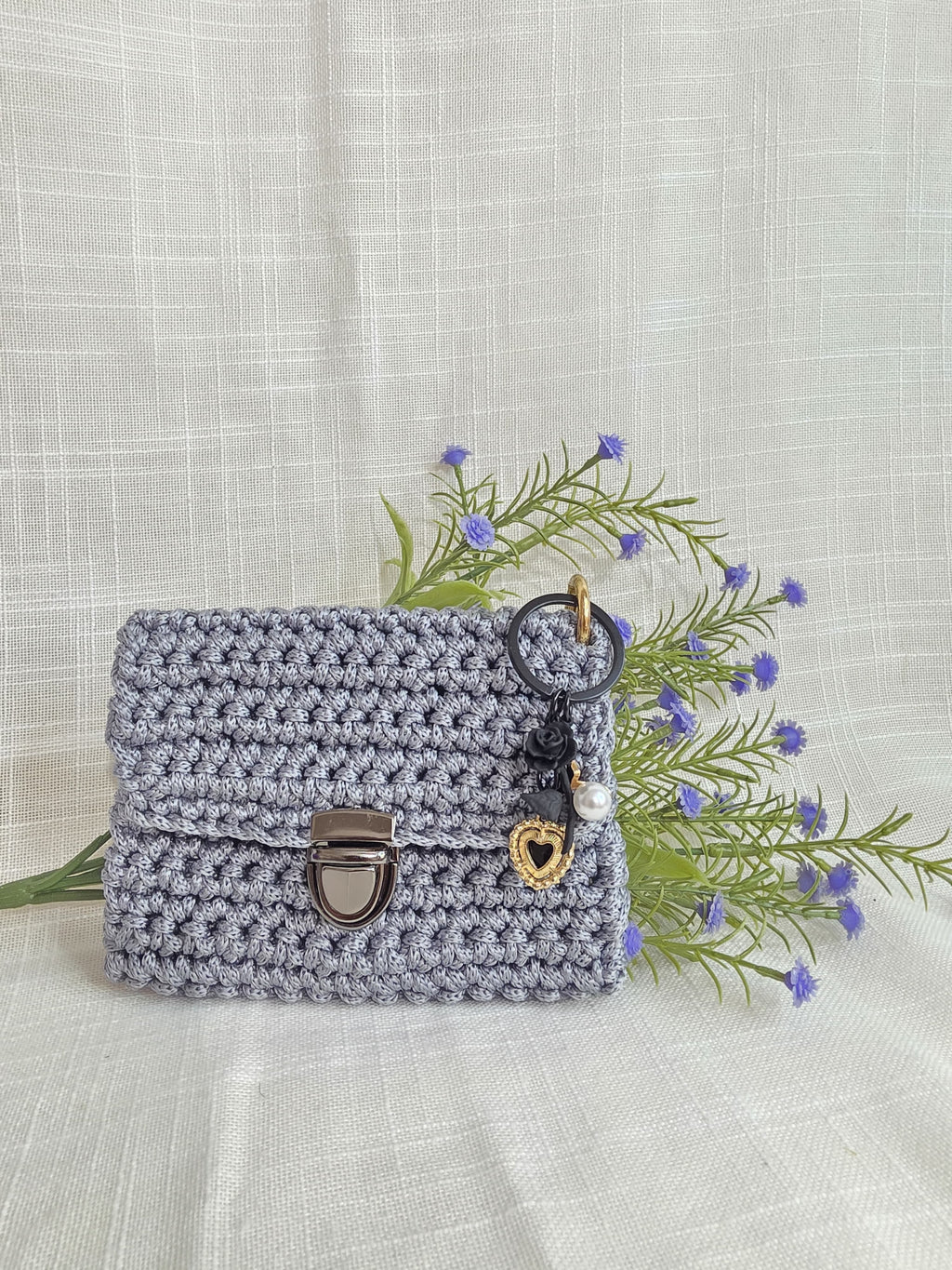 Juego de monedero y aretes