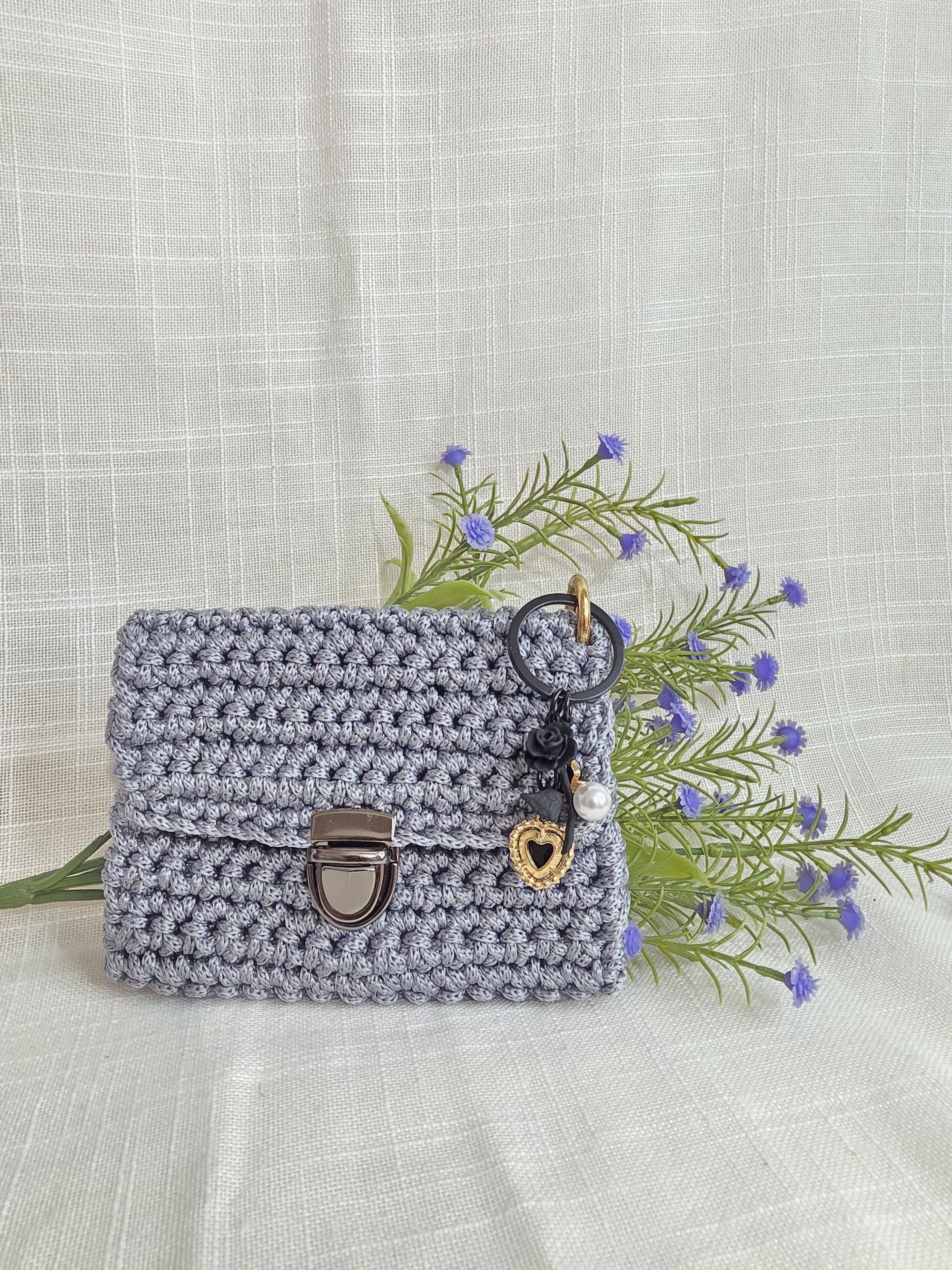 Juego de monedero y aretes