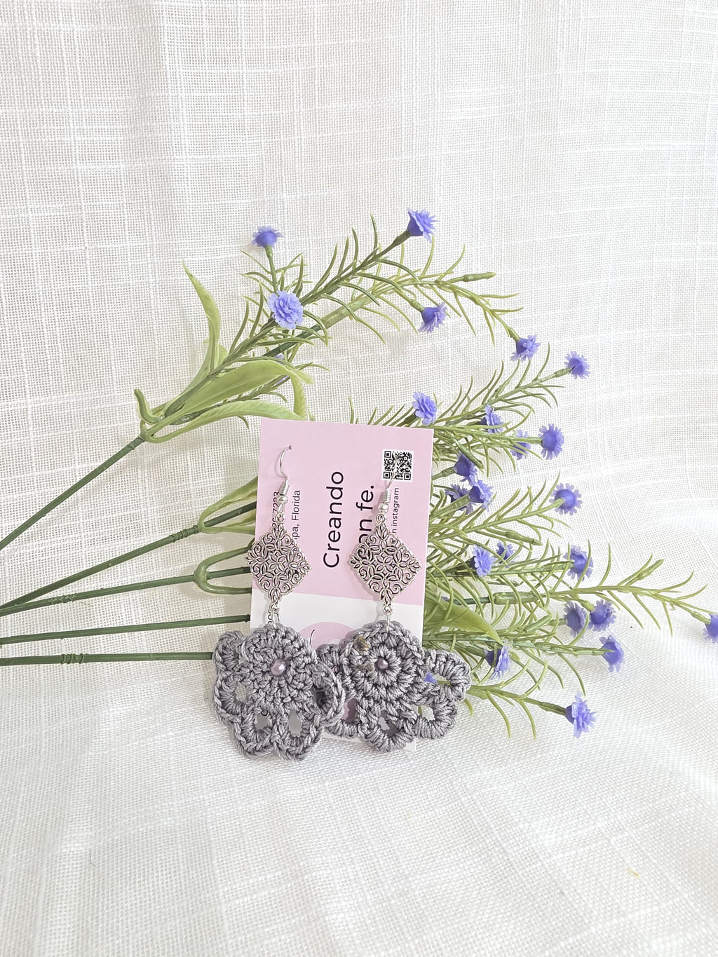 Juego de monedero y aretes