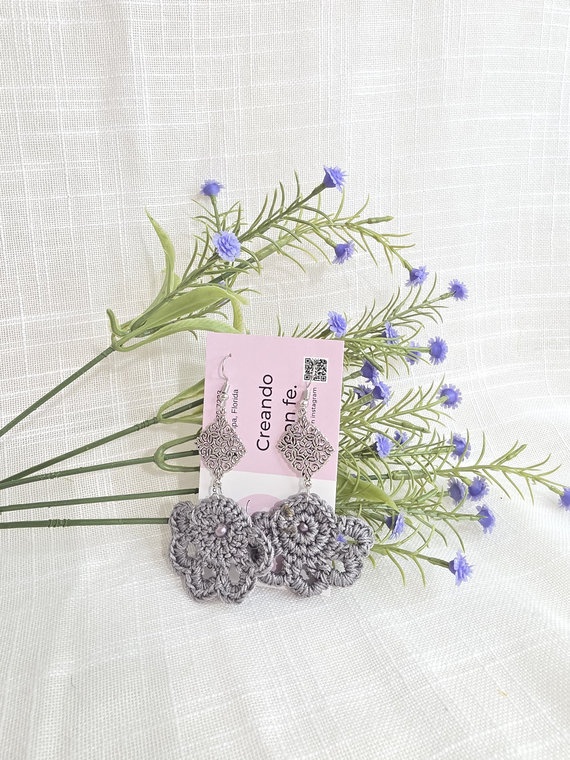 Juego de monedero y aretes