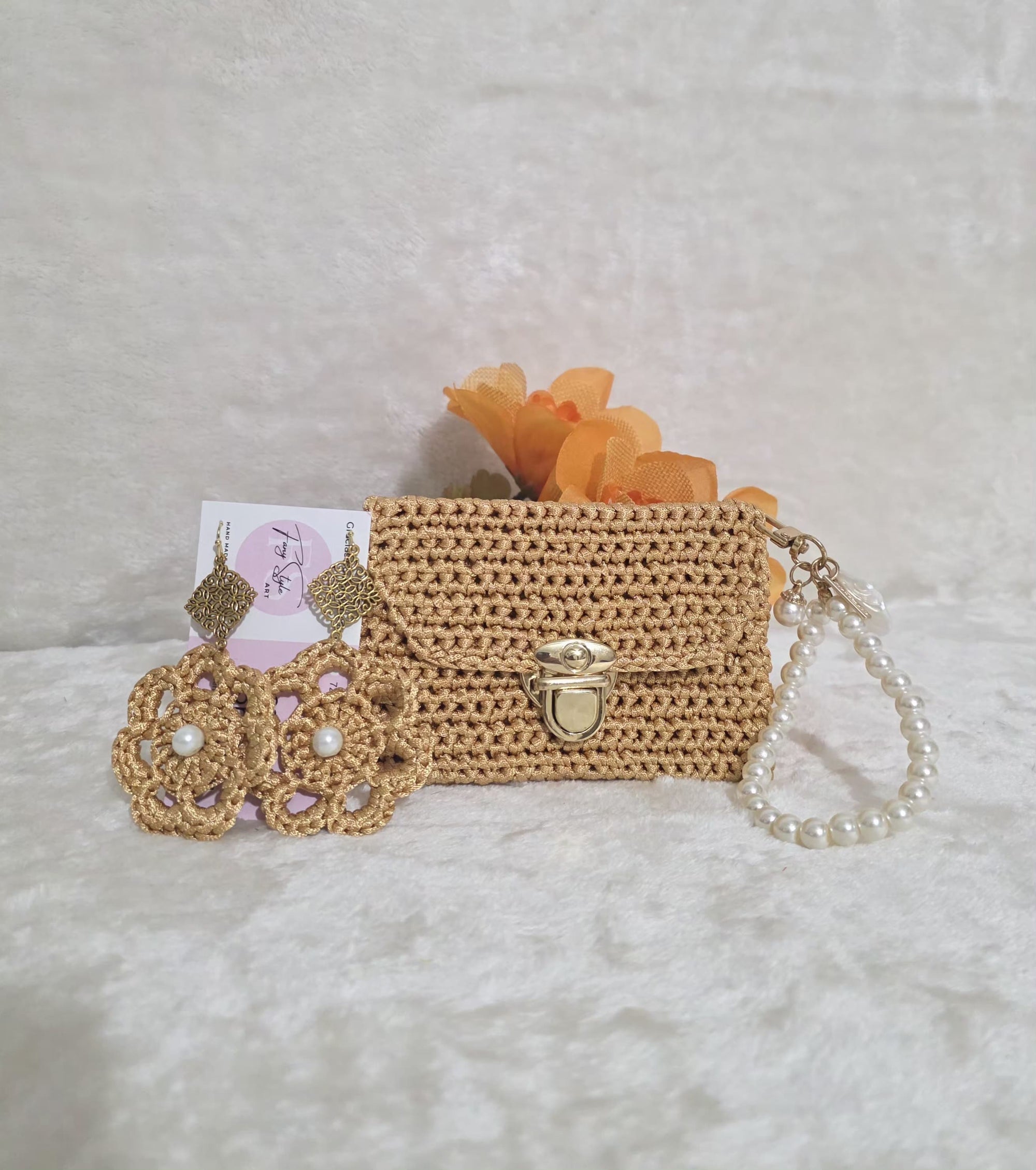 Juego de monedero y aretes