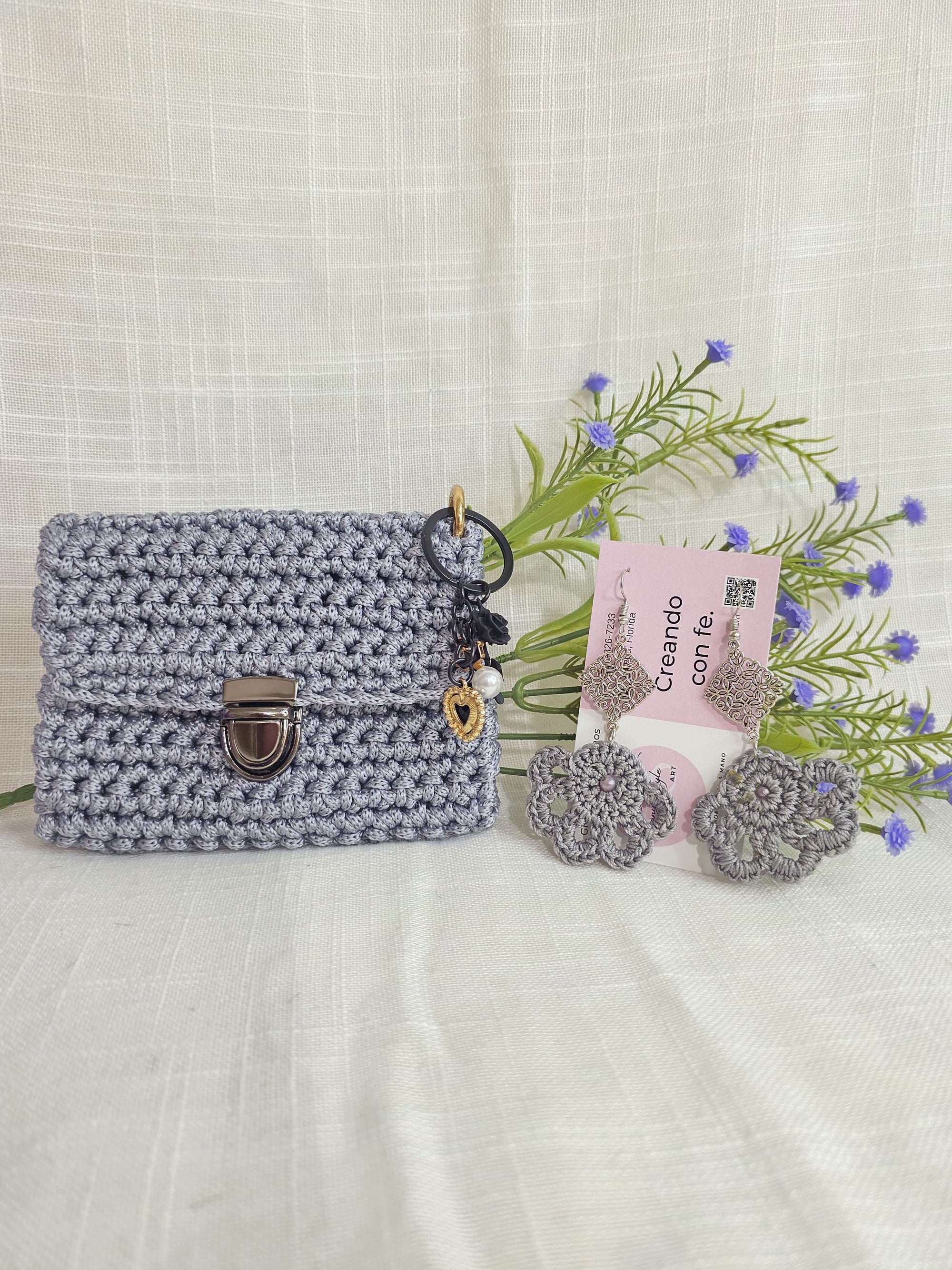 Juego de monedero y aretes