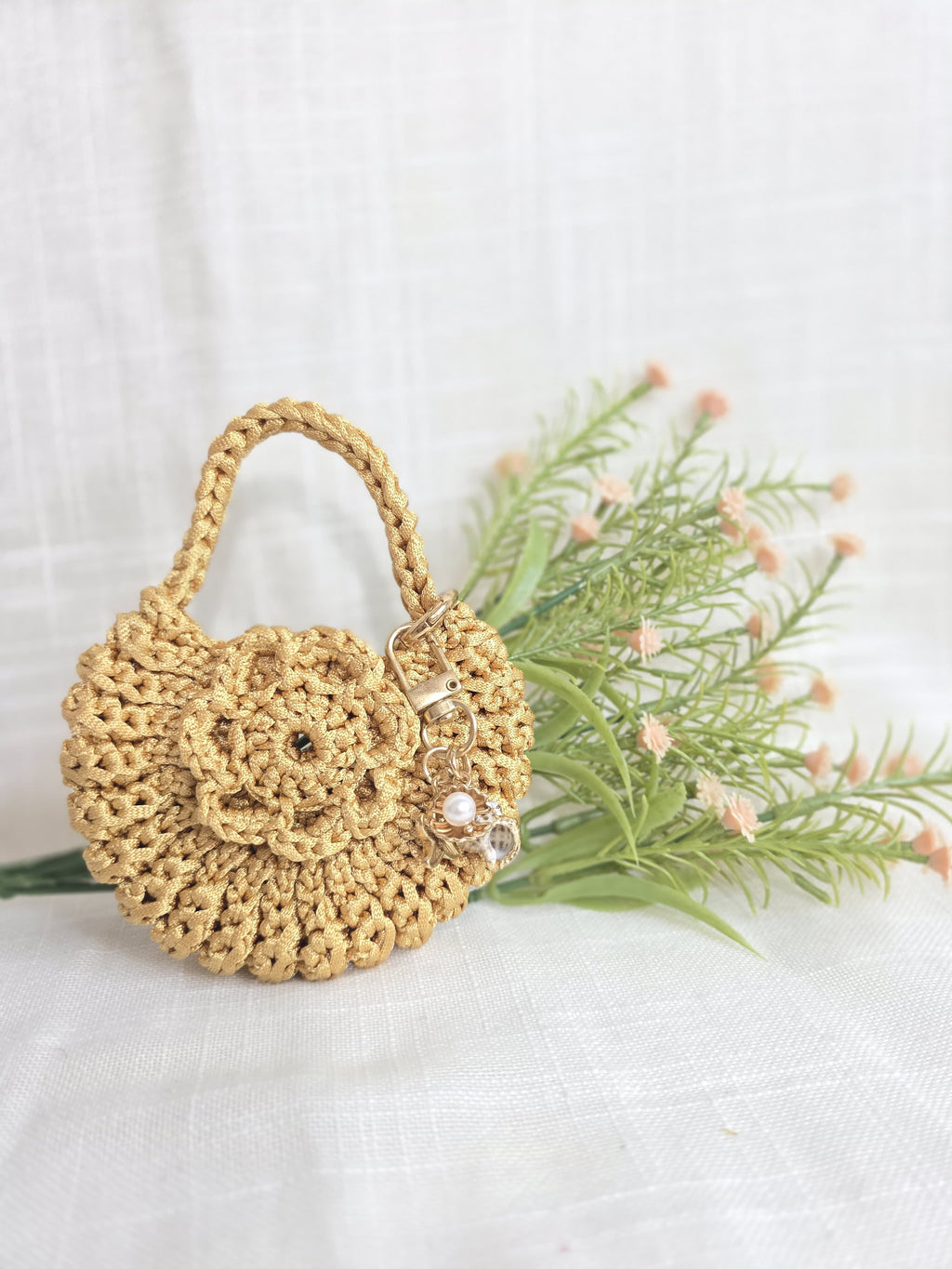 Juego de monedero y aretes